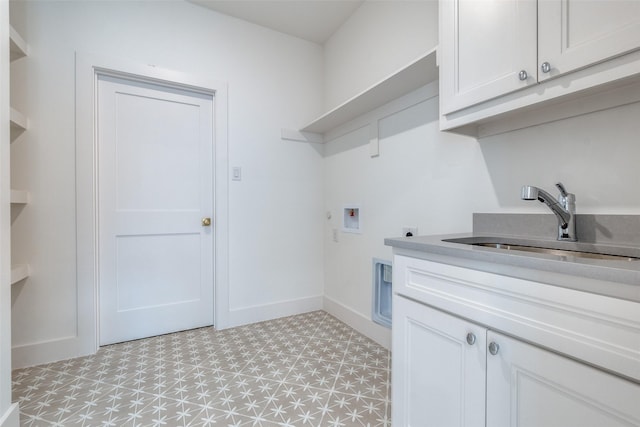 washroom featuring cabinets, hookup for a washing machine, sink, and electric dryer hookup