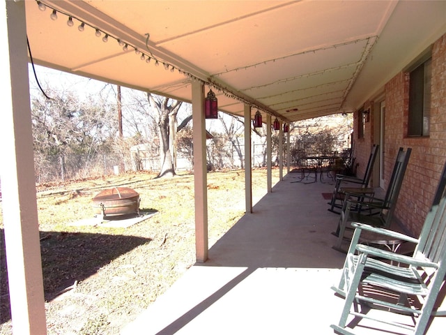 view of patio / terrace featuring a fire pit