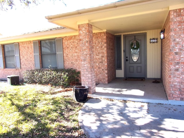 doorway to property featuring cooling unit