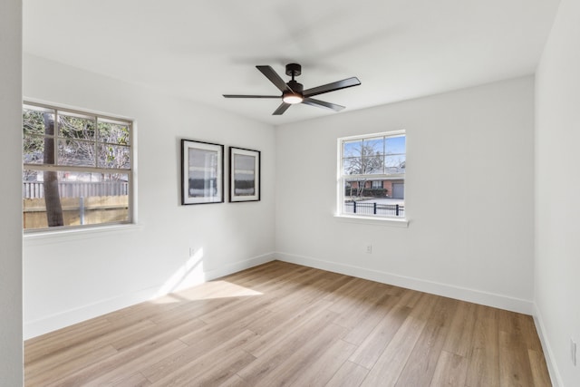 unfurnished room with ceiling fan and light hardwood / wood-style floors