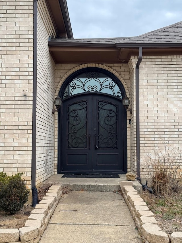 doorway to property with french doors