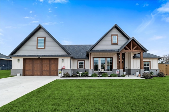 modern farmhouse style home with a garage and a front yard