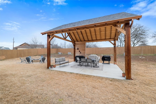 exterior space featuring a fire pit, a patio, and a gazebo