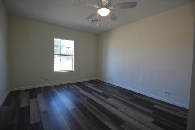 231 N 5th Ave, Munday, TX 76371 - spare room with dark wood-type flooring and ceiling fan