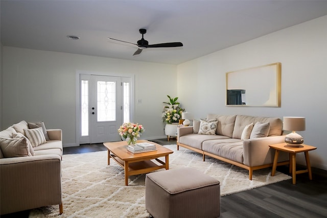 231 N 5th Ave, Munday, TX 76371 - living room featuring hardwood / wood-style flooring and ceiling fan