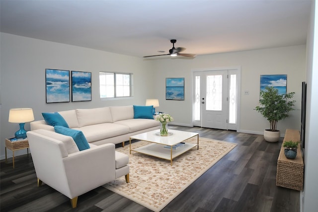 231 N 5th Ave, Munday, TX 76371 - living room featuring dark hardwood / wood-style floors and ceiling fan
