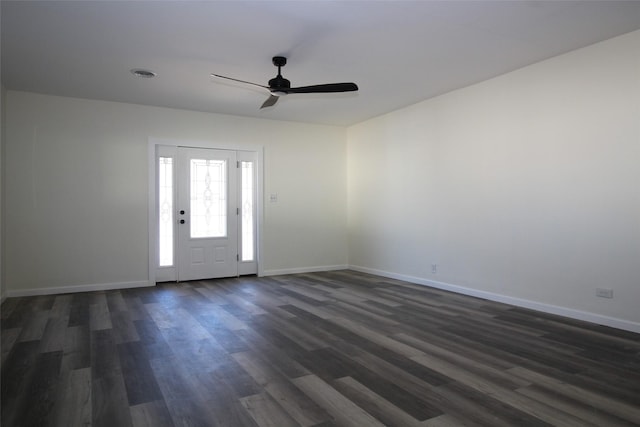 231 N 5th Ave, Munday, TX 76371 - entryway featuring ceiling fan and dark hardwood / wood-style flooring