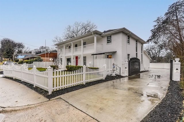 view of front of house with a balcony