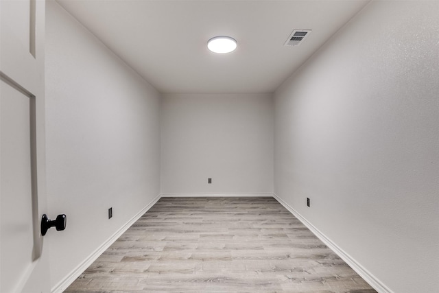 unfurnished room featuring light hardwood / wood-style floors