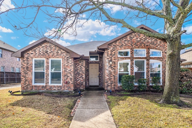 view of front of home with a front lawn