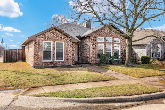 view of property with a front lawn