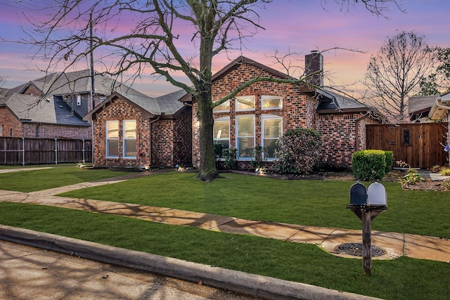 view of front of home featuring a yard