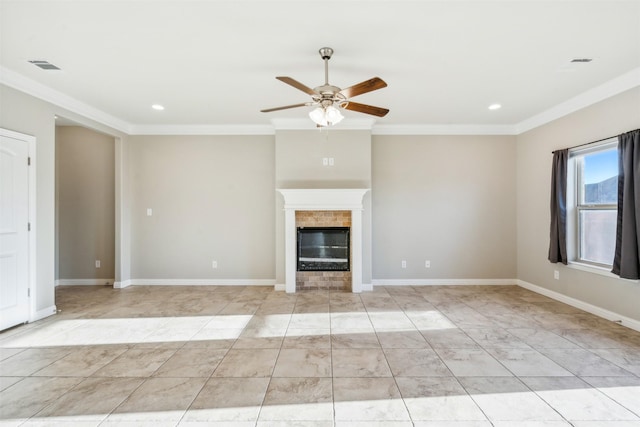 unfurnished living room featuring crown molding, ceiling fan, and a fireplace