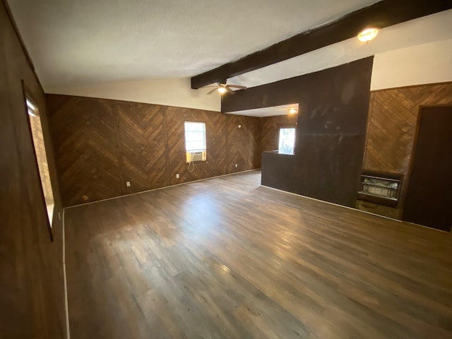 bonus room with dark hardwood / wood-style flooring, vaulted ceiling with beams, ceiling fan, and wood walls