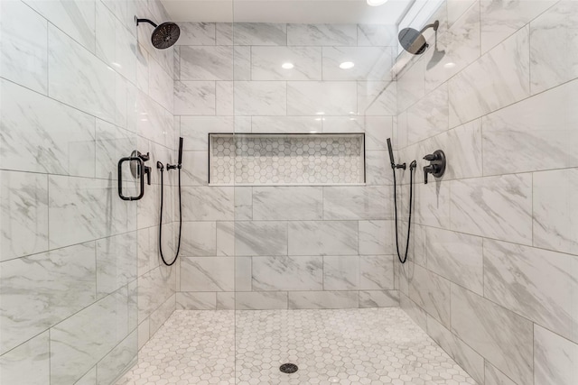 bathroom with a shower with shower door