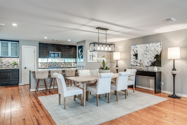 dining space featuring light hardwood / wood-style flooring