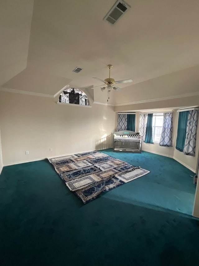 unfurnished bedroom featuring ceiling fan and carpet