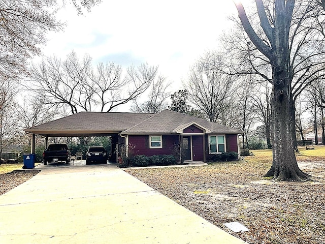 view of front of home featuring a carport