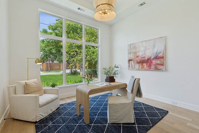 dining space featuring wood-type flooring