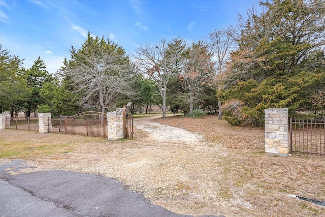 view of yard featuring a gate and fence