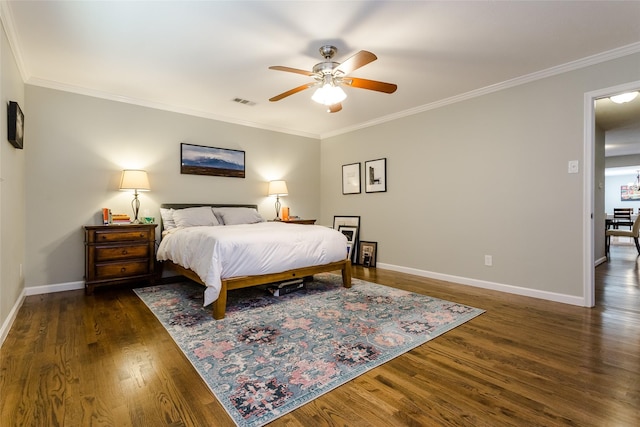 bedroom with ceiling fan, ornamental molding, and dark hardwood / wood-style floors