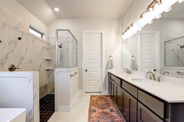 bathroom with vanity and shower with separate bathtub