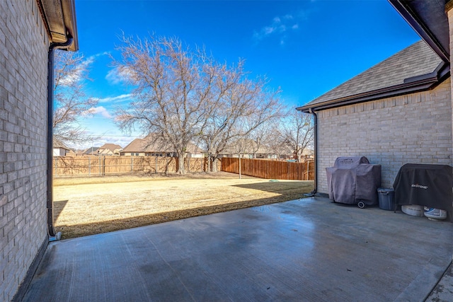 view of patio / terrace featuring a grill