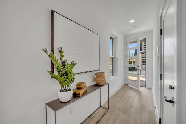 corridor featuring light hardwood / wood-style flooring