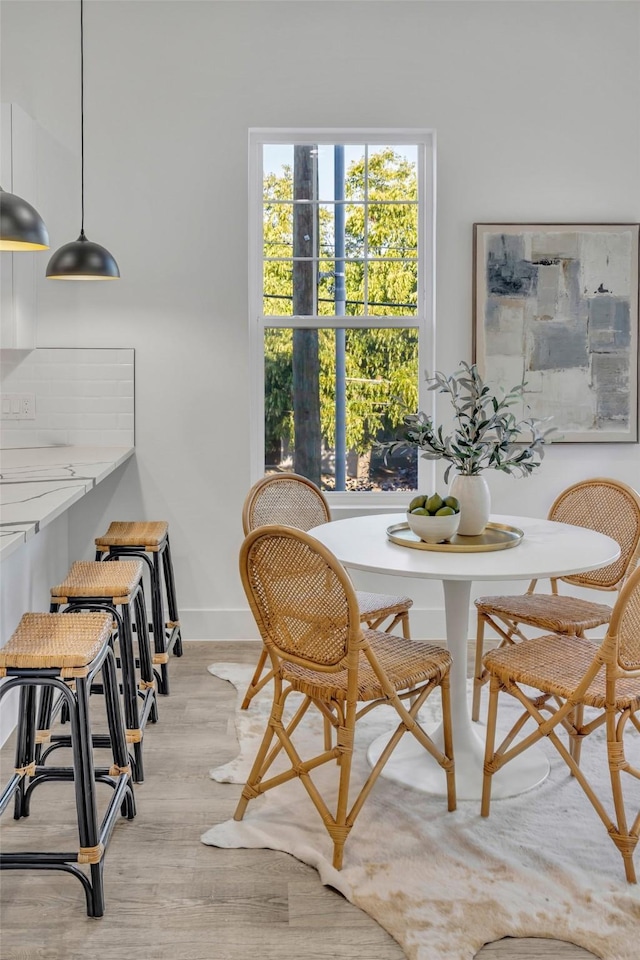 dining room featuring light wood-type flooring