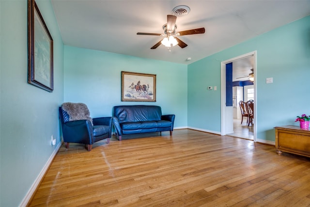 1241 Cypress Dr, Richardson, TX 75080 - living area with ceiling fan, baseboards, light wood-type flooring, and visible vents