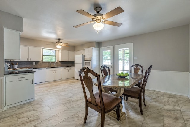 1241 Cypress Dr, Richardson, TX 75080 - dining room featuring marble finish floor and a ceiling fan