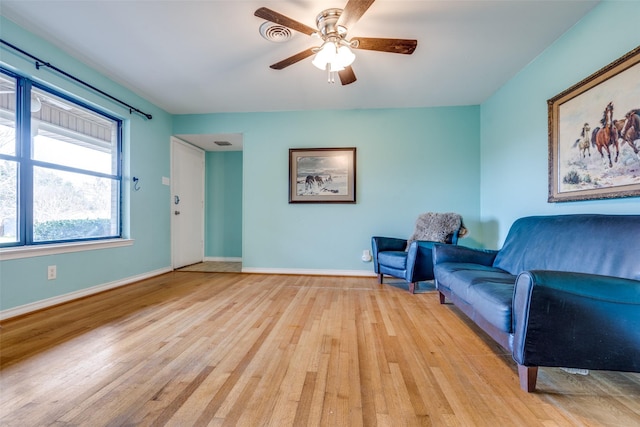 1241 Cypress Dr, Richardson, TX 75080 - sitting room with baseboards, ceiling fan, visible vents, and light wood-type flooring