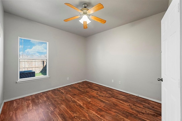 unfurnished room featuring ceiling fan and dark hardwood / wood-style flooring