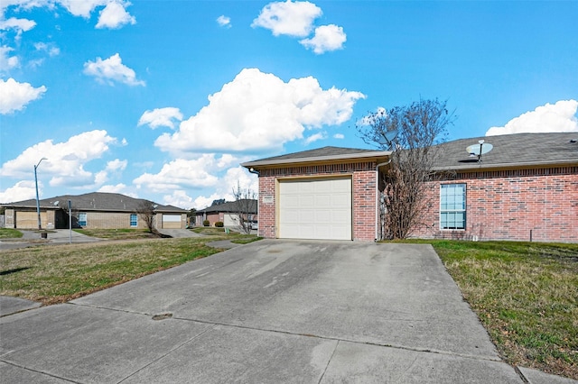 exterior space with a garage and a yard