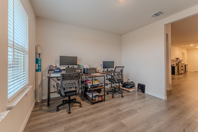 home office featuring light wood-type flooring