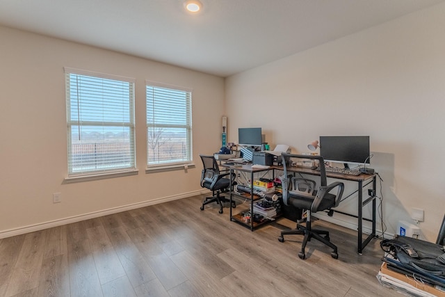 home office featuring light hardwood / wood-style flooring