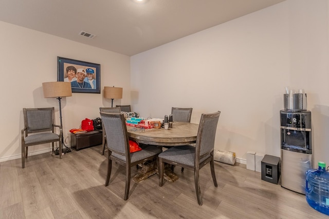 dining room featuring light hardwood / wood-style floors