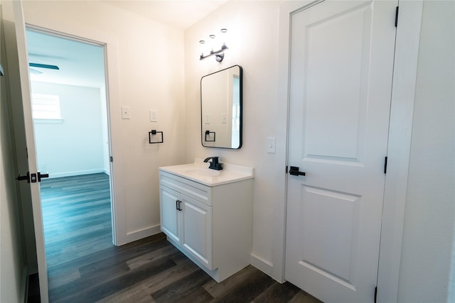 bathroom with vanity and hardwood / wood-style floors