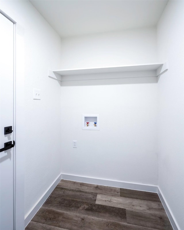 laundry room with washer hookup and dark hardwood / wood-style floors