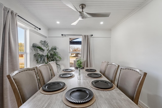 dining room featuring crown molding, ceiling fan, and a healthy amount of sunlight