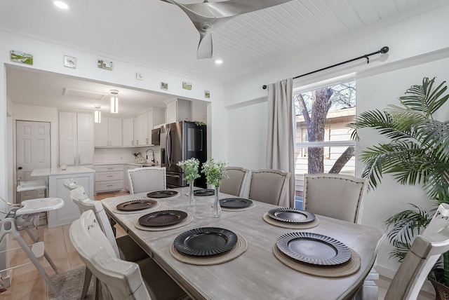 dining space featuring sink