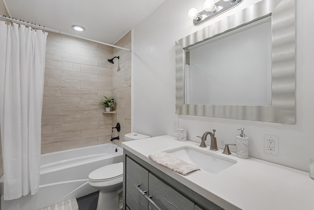 full bathroom with shower / tub combo, vanity, and toilet