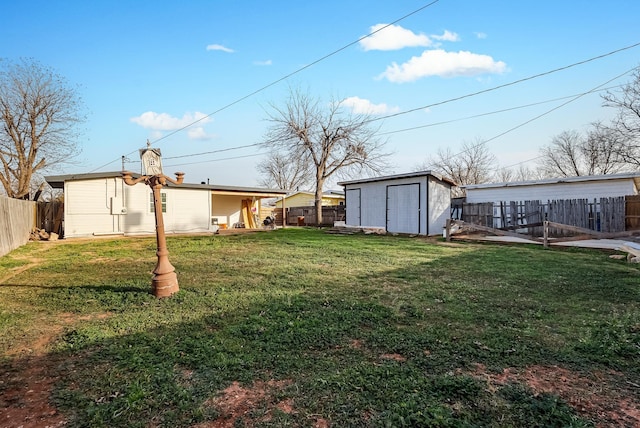 view of yard featuring a storage unit