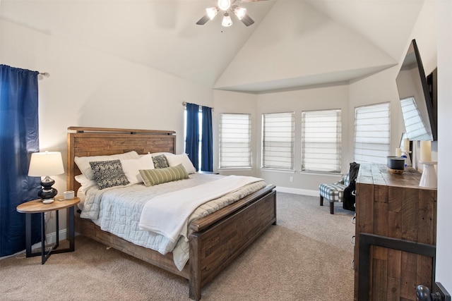 bedroom featuring ceiling fan, light colored carpet, and high vaulted ceiling