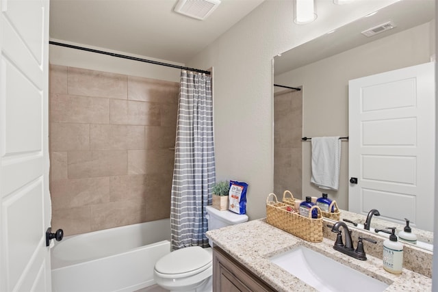 full bathroom with vanity, toilet, and shower / bath combo with shower curtain