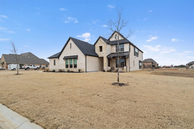 view of front of property with a front yard