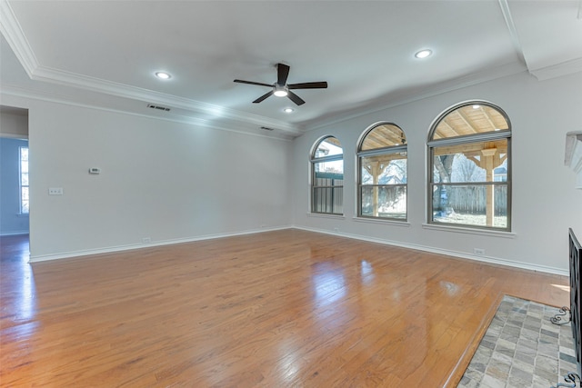 unfurnished room featuring crown molding, light hardwood / wood-style flooring, and ceiling fan