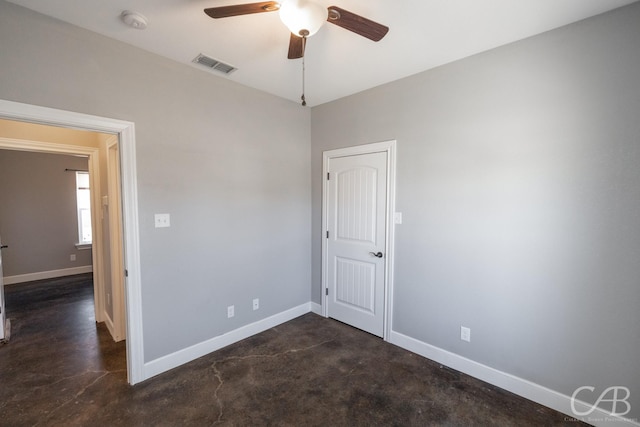 unfurnished room with ceiling fan