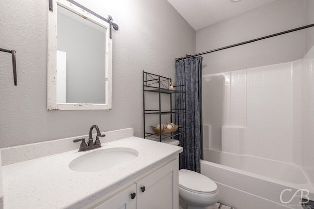 full bathroom with vanity, shower / tub combo, and toilet