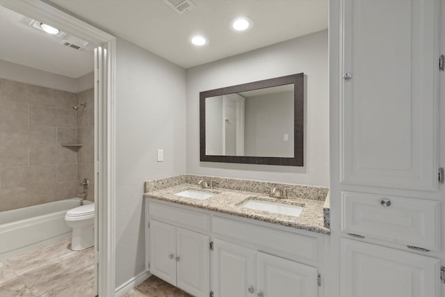 unfurnished room with visible vents, baseboards, wood finished floors, and ceiling fan